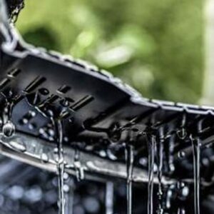 Gutter Clean Pro gutter guard with Vortex technology draining high volumes of water during heavy storms for improved gutter performance